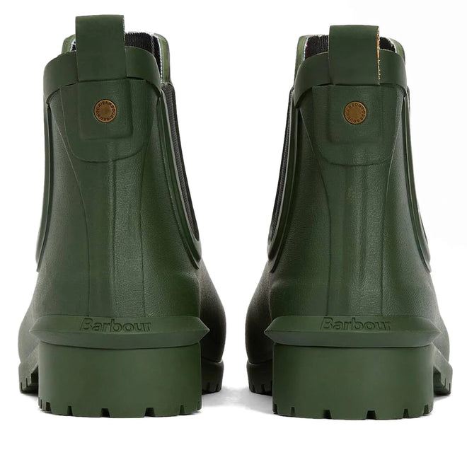 The Barbour Wilton Olive Chelsea Wellingtons Womens Rainboot is shown from the back, with pull tabs, rugged soles, Barbour branding above the heel, and a signature tartan lining., 190375411737, 190375411898, 190375411973, 190375412116, 190375412192, 190375412321