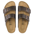 Pair of brown leather birkenstock regular with  sandals. Top down view showing 2 leather straps, suede foot bed  and metalliic buckles on a white background., 
4013871069898,36750,4013871008354,4013871009184,4013871021544,4013871037750,4013871041603,4013871063766,4013871063865,4013871066453,4013871076551,4013871077572, 
