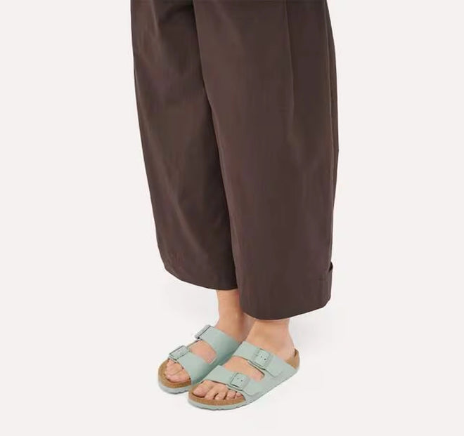 BIRKENSTOCK Arizona Birko Flor Pure Sage Regular Width 2 Strap Sandals worn with brown cropped trousers., 54834, 54835, 54836, 4067708125677, 4067708125714, 4067708125752, 4067708125790, 54841, 54842, 54843, 54844, 54845, 54846