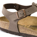 Close-up of a BIRKENSTOCK Kairo Womens Birkibuc Mocha Brown sandal (Regular Width) highlighting the adjustable buckle strap, cork-latex footbed, and part of the sole., 4052001079413, 4052001079420, 4052001079437, 4052001079444, 4052001079451, 50471, 50472