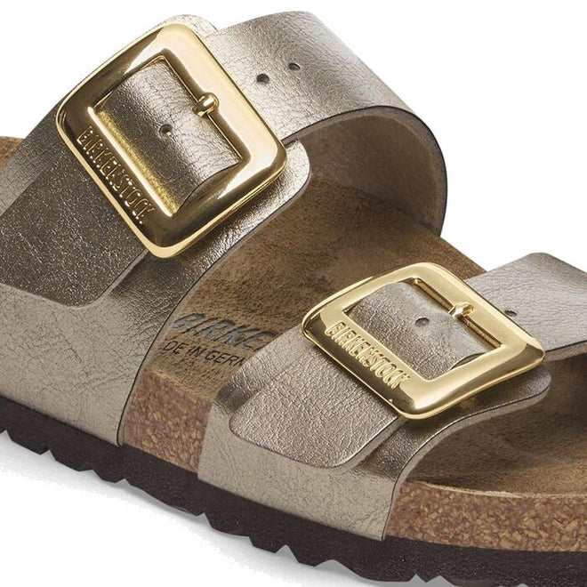 Pair of Birkenstock sandals with gold buckles on a white background,
4066648998228,
4066648998266,
4066648998303,