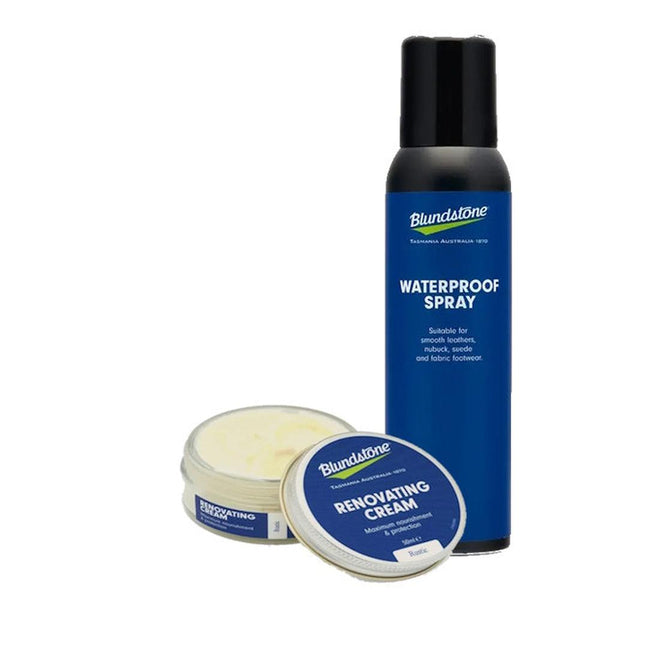 The Blundstone Renovating Cream Rustic and Waterproofing Spray Bundle is displayed, featuring essential leather footwear care with blue labels and white text; the cream’s lid sits beside the open container.