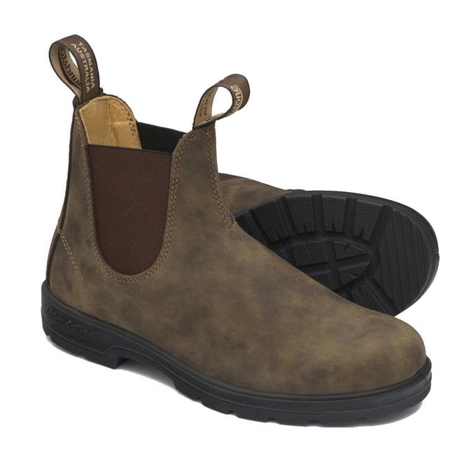 A pair of blundstone 585 chelsea boots in rustic brow, showing the outside of the right foot and the sole of the left foot. pull on tabs on both front and back to make easie to get on and off. elesatic gusset on both sides of the leg