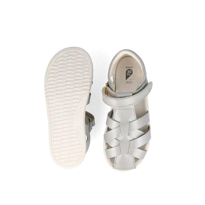 A pair of Bobux Kids Plus KP Tropicana II Metallic Silver Quick Dry Sandals (838320) shown from above and below: one highlights the woven upper and ankle strap; the other displays the textured rubber sole and inner size label., 9420075778146, 9420075773325, 9420075780118, 9420075774414, 9420075769502, 9420075771581, 9420075777224