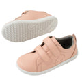 The Bobux KP Kids Plus Grass Court 2 II Leather Sneaker in Seashell features pink leather, white soles, two adjustable Velcro straps, and small side perforations. One shoe is shown from the side, the other displays its textured sole., 9420074831538, 9420074831545, 52192, 9420074831569, 9420074831576, 9420074831583, 9420074831590