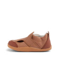 The Bobux XP Explorer Breeze First Walker Sandal Brown 502407 is shown in profile with cut-out sides, a velcro strap, and a flexible sole on a white background—ideal as a first walker sandal., 9420075761438, 9420075762749, 9420075762725, 9420075761766