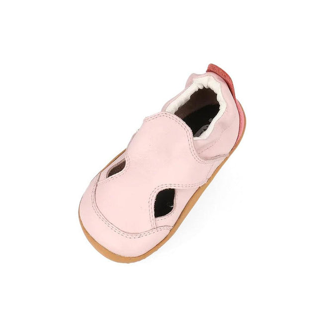 The Bobux XP Explorer Breeze First Walker Sandal in Rose Water Pink (502405) is a single baby shoe for first walkers, with cut-out details, a flexible sole, and red heel accent, shown on a white background., 9420075784864, 9420075786004, 9420075783645, 9420075784949