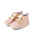 The Bobux Step Up SU Hi Court Boot Ballet Pink 750818 is a pair of pink kids' leather sneakers with white soles, two shiny gold Velcro straps per shoe, decorative side stitching, inspired by classic Grass Court High designs.