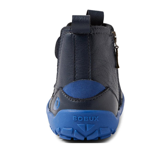 Rear view of the Bobux IW Iwalk Trail Leather Boot Navy Alpha for kids, featuring a barefoot-shaped toe-box, bright blue zero drop sole, side zipper, and BOBUX embossed on the heel; displayed on a white background., 9420068563568, 9420068563575, 9420068563582, 9420068563599
