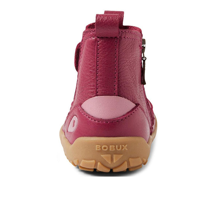 Back view of the Bobux IW Iwalk Trail Leather Boot Beaujolias Purple Alpha, featuring a pink leather upper, tan zero-drop sole, barefoot-shaped toe box, pull tab, side zipper, and BOBUX embossed on the heel., 9420068563667, 9420068563674, 9420068563681, 9420068563698