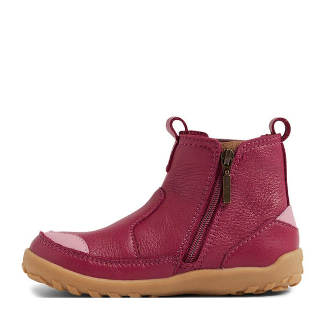 The Bobux IW Iwalk Trail Leather Boot Beaujolias Purple Alpha is a kids’ leather boot in dark purple with light accents, featuring a barefoot-shaped toe box, side zipper, pull tabs, tan rubber sole, and textured tread., 9420068563667, 9420068563674, 9420068563681, 9420068563698
