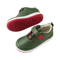 The Bobux IW Iwalk Backspin Leather Boot in Bronze Green is shown—one from the side, one highlighting its red tread. Both kids’ sneakers feature red elastic laces, a hook-and-loop strap, and red soles for easy fastening and bold style., 9420074818072, 9420074818089, 9420074818096, 9420074818102, 9420074818119