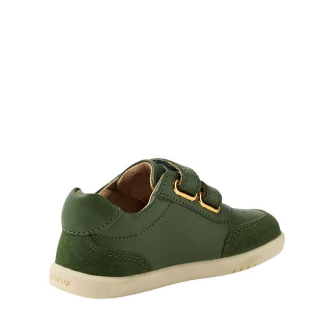 The Bobux IW Iwalk Champ Sneaker Bronze Green for toddlers is shown from a rear side angle, featuring a green upper, beige sole, yellow eyelets, and two adjustable hook-and-loop straps against a white background., 9420074810786, 9420074810793, 9420074810809, 9420074810816, 9420074810779, 9420074810786, 9420074810793, 9420074810809, 9420074810816