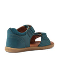 A Mediterranean green children’s sandal—Bobux IWalk Driftwood Sandal Mediterrainean Green Open Toe—inspired by the classic Driftwood design, features a closed heel, open toe style, and adjustable straps. Viewed from the back side angle, these toddler boys’ leather sandals are complemented by a light brown sole for a timeless look., 9420074807601, 9420074807618, 9420074807625, 9420074807632, 9420074807649