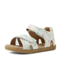 Elegant and comfortable, the Bobux IWalk Flora Toddlers Sandal White Floral Open Toe features a tan sole and white straps embellished with a delicate pastel floral and butterfly pattern. Designed with an easy Velcro closure and a thick sole for added support, these sandals are perfect for any little explorer.
