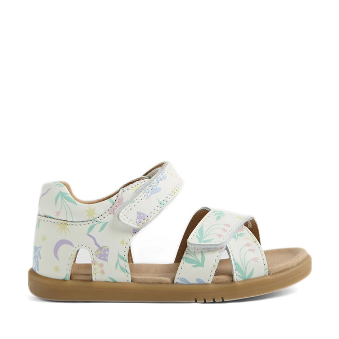 Introducing the Bobux IWalk Flora Toddlers Sandal White Floral Open Toe: a charming children’s sandal featuring a light tan sole and white leather straps adorned with pastel nature and star patterns. Inspired by the beloved Bobux Flora design, this style offers two adjustable Velcro straps across the top and ankle for a secure fit, making it an excellent choice for parents seeking comfortable and stylish leather sandals for toddlers.