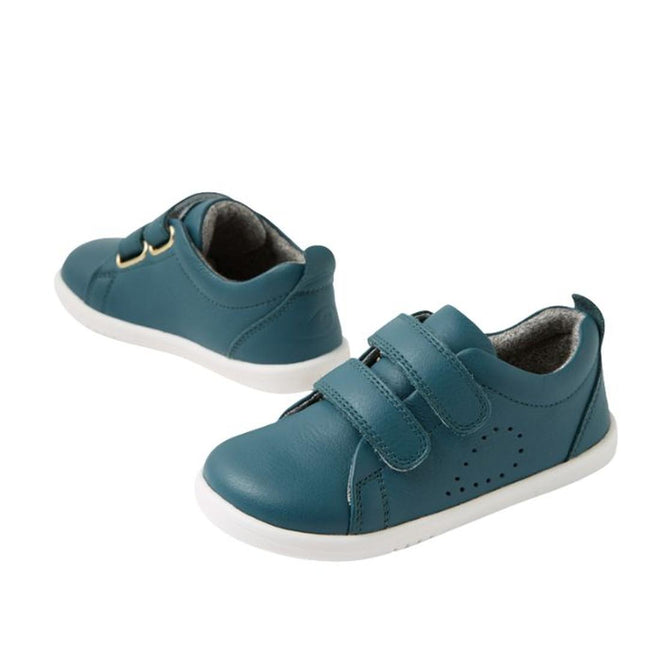 The Bobux IW Iwalk Grass Court Leather Sneaker in Mediterranean Green is a toddler shoe with white soles, Velcro straps, and side perforations, featuring a street-style trainer design, shown on a white background., 9420074806734, 9420074806741, 9420074806758, 9420074806765, 9420074806772