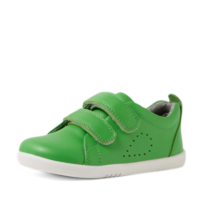 The Bobux Iwalk Toddlers Grass Court Retro Green Leather Trainer is a vibrant green children’s leather sneaker featuring two Velcro straps, a white sole, decorative stitching, and small side perforations—displayed at an angle against a white background., 9420074806789, 9420074806796, 9420074806802, 9420074806819, 9420074806826