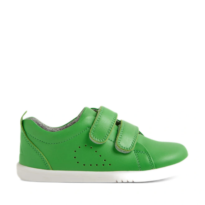 A vibrant green Bobux Iwalk Toddlers Grass Court Retro Green Leather Trainer with two velcro straps, perforated details on the side, a grey inner lining, and a white rubber sole, displayed in side profile on a plain white background., 9420074806789, 9420074806796, 9420074806802, 9420074806819, 9420074806826