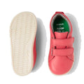 The Bobux IW Iwalk Grass Court Leather Sneaker in Radiant Raspberry is a pink leather toddler girls' shoe with two Velcro straps; one shown from the top, the other displays its textured white sole and BOBUX x BLOOM insole print., 9420068550902, 9420068550919, 9420068550926, 9420068550933, 9420068550940