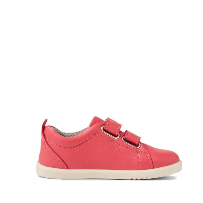 A single Bobux IW Iwalk Grass Court Leather Sneaker in Radiant Raspberry, featuring two Velcro straps and a white sole, is shown side-on against a plain background. Podiatrist-endorsed leather ensures comfort and style for toddlers., 9420068550902, 9420068550919, 9420068550926, 9420068550933, 9420068550940