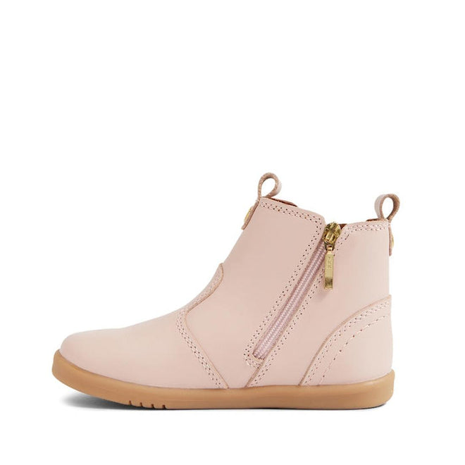 The Bobux IW Iwalk Jodhpur Leather Boot in Cameo Rose Pink features a light pink leather upper, tan rubber sole, gold side zipper, front and heel pull tabs, minimal stitching, a smooth finish, and is podiatrist endorsed for toddlers., 9420068539617, 9420068539624, 9420068539631, 9420068539648, 9420068539655