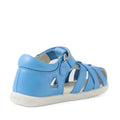 A Bobux Iwalk IW Tropicana II Baltic Sea Blue leather toddler sandal featuring cutout details, closed-toe protection, a closed heel, and a white sole, viewed from the back left side., 9420074810250, 9420074810267, 9420074810274, 9420074810281, 9420074810298