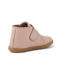 The Bobux IW Iwalk Willow Leather Boot in Cameo Rose Pink is a pale pink toddler shoe with scalloped edges, an adjustable Velcro strap, and a light brown rubber sole, shown from the back and side on a white background., 9420068545120, 9420068545137, 9420068545144, 9420068545151