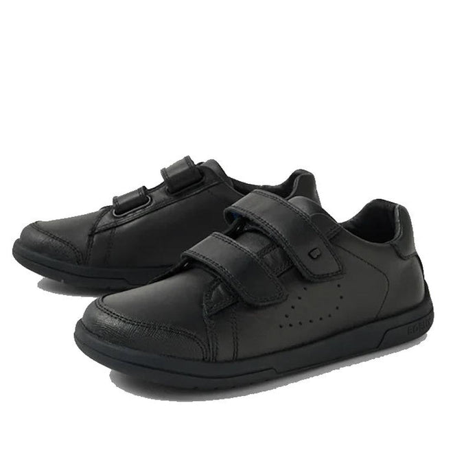 The Bobux Kid+ Jacks Black School Leather Shoe Sneaker is a kids’ school shoe in black leather with two adjustable velcro straps, stitched detailing, a scuff-resistant toe cap, and durable rubber soles, shown on a white background.
