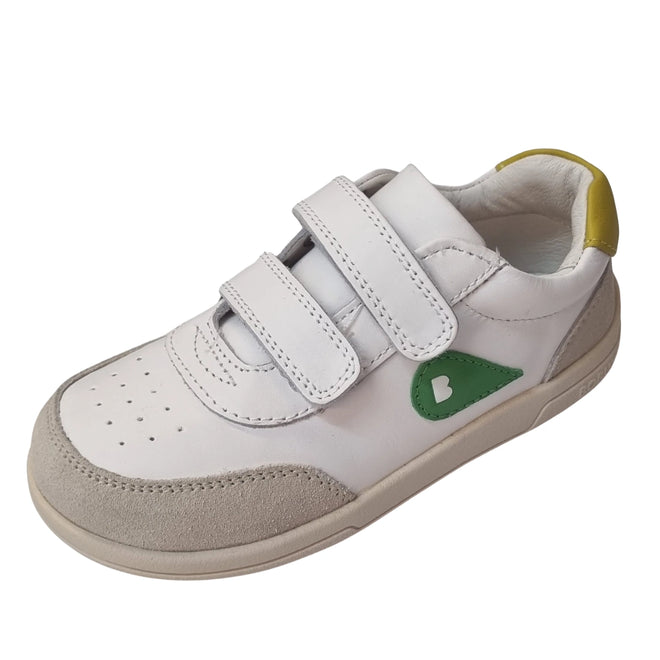 The Bobux KP Kids Plus Champ Leather Sneaker in White Green features soft white leather, two convenient hook and loop straps for easy fastening, a beige toe cap, a green side detail with a ‘B’, and a yellow accent on the heel—making these sturdy sneakers ideal for kids’ everyday adventures.