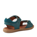 A Mediterranean Green Bobux KP Kids Plus Driftwood Leather Sandal, designed with adjustable straps and a cushioned brown sole, is shown at an angle highlighting the back and side—ideal for boys searching for stylish and comfortable leather sandals for everyday adventures., 9420074859013, 9420074858993, 9420074859006, 9420074858979, 9420074858962, 9420074858986, 9420074858955