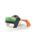 The Bobux KP Kids Plus Dune Leather Sandal Navy, designed as breathable summer shoes with adjustable straps, features a white sole, orange front straps, a black middle strap, and a green padded heel strap. Shown here from the back left angle., 9420074855763, 9420074855787, 9420074855770, 9420074855756