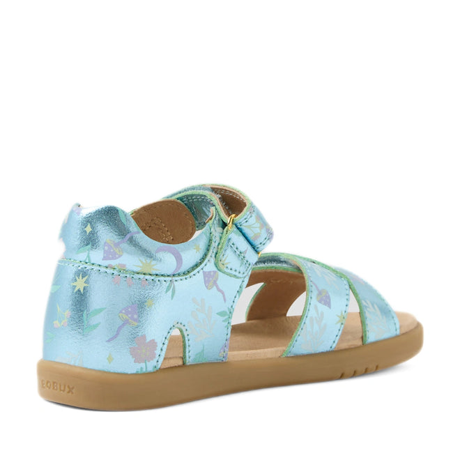 A Bobux KP Kids Plus Flora Leather Sandal in Jelly Mint Metallic Blue for kids, featuring floral and star patterns, a closed heel, open toe design, velcro strap fastening, and a tan rubber sole—shown from the back and side.