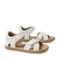 The Bobux KP Kids Plus Flora Leather Sandal in White Floral features two adjustable leather straps with a pastel flower print and a tan sole, combining comfort and charming floral style for kids. Displayed on a white background.