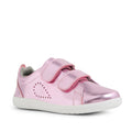 A shiny pink metallic Bobux KP Kids Plus Grass Court 2 II Leather Sneaker featuring two Velcro straps, a white sole, heart-shaped perforated dots on the side, and designed for a wide fit.