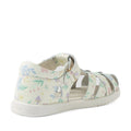 A white leather kids’ sandal called the Bobux Kids Plus KP Tropicana II White Floral Quick Dry Sandal, featuring pastel floral and mushroom patterns, a closed heel, and open toe straps—shown at an angle from the back and side—captures the charming style of classic Bobux Tropicana sandals., 9420074861443, 9420074861450, 9420074861467, 9420074861405, 9420074861412, 9420074861429, 9420074861436