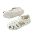 Bobux Kids Plus KP Tropicana II White Floral Quick Dry Sandal features a children's white sandal design with pastel floral patterns, a closed toe, and an adjustable Velcro strap. Crafted from premium leather for durability and comfort, one sandal is shown upright to display the top while the other is flipped to reveal the sole., 9420074861443, 9420074861450, 9420074861467, 9420074861405, 9420074861412, 9420074861429, 9420074861436