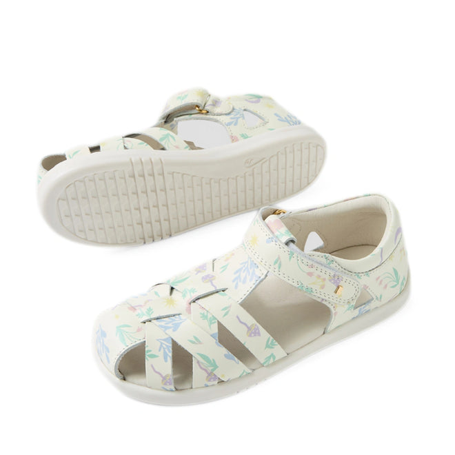 Bobux Kids Plus KP Tropicana II White Floral Quick Dry Sandal features a children's white sandal design with pastel floral patterns, a closed toe, and an adjustable Velcro strap. Crafted from premium leather for durability and comfort, one sandal is shown upright to display the top while the other is flipped to reveal the sole., 9420074861443, 9420074861450, 9420074861467, 9420074861405, 9420074861412, 9420074861429, 9420074861436