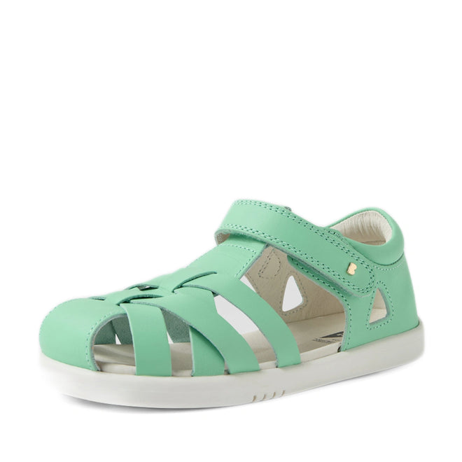Introducing the Bobux Kids Plus KP Tropicana II Jelly Mint Quick Dry Sandal — a mint green children's sandal inspired by the iconic Tropicana design. This stylish closed-toe sandal features a white sole, convenient Velcro strap, and cut-out details on the sides and front for excellent ventilation., 9420074861191, 9420074861207, 9420074861214, 9420074861221, 9420074861238