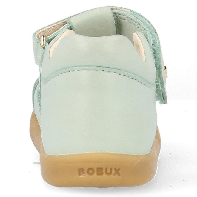 The Bobux Iwalk IW Compass Kids Mist Blue Leather Sandal 641205 is a closed-toe leather sandal for children with a beige sole, velcro strap, soft rounded design, and BOBUX branding on the heel—ideal for summer fun., 9420075708464, 9420075708471, 9420075708488, 9420075708495, 9420075708501