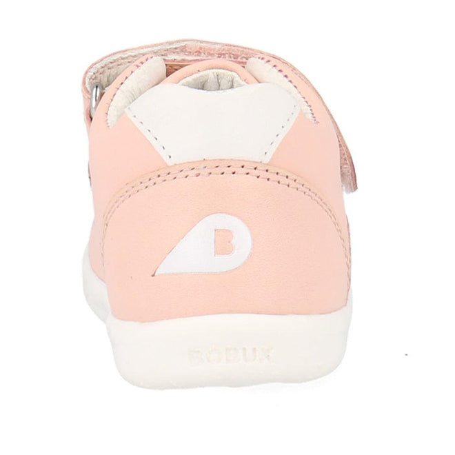 The back view of the Bobux Kids IWalk IW Comet Sneaker in Seashell Pink/White shows a pink and white retro-inspired design with a B logo on the heel, "BOBUX" embossed on the flexible white sole, and a light interior lining complementing the leather upper., 9420075706286, 9420075706293, 9420075706309, 9420075706316, 9420075706323