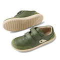 The Bobux KP Kids Plus Champ II Sneaker in Bronze Green Juniors features leather uppers, beige durable soles, two adjustable velcro straps, a rounded toe, and front perforated detail; shown from the side and bottom views., 9420074829573, 9420074829580, 9420074829597, 9420074829603, 9420074829610