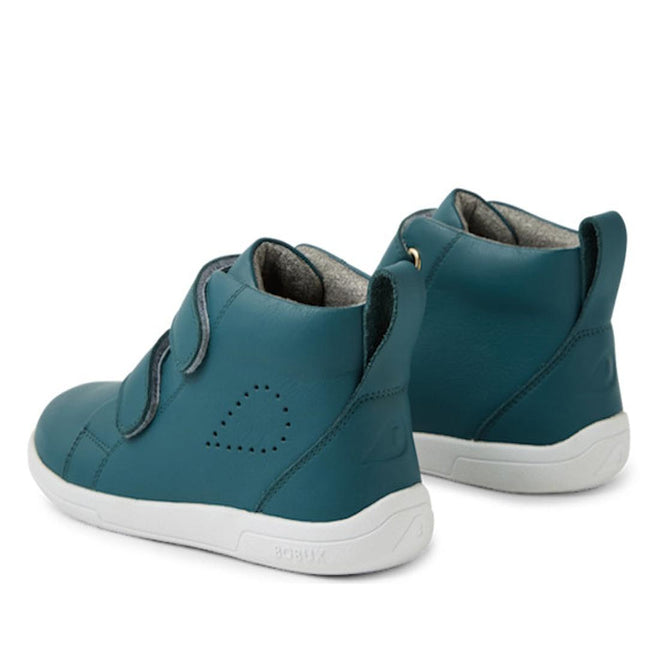 The Bobux KP Grass Court High II Boot Mediterranean Green Juniors features a premium teal leather upper with perforated heart design, white soles, adjustable Velcro straps, and a soft padded interior for kids' comfort., 9420074859099, 9420074859105, 9420074859112, 9420074859129, 9420074859136, 9420074859143, 9420074859150