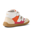 The Bobux KP Kids Plus Harley Ankle Leather Boot in Radiant Raspberry for juniors is shown from a side-rear angle, featuring a beige durable sole, white upper, orange and pink panels, gold details, double Velcro straps, and “BOBUX” printed in gold near the heel., 9420074833648, 9420074833655, 9420074833662, 9420074833679