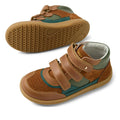 The Bobux KP Kids Plus Harley Ankle Leather Boot Caramel Tan Juniors features brown, green, and tan colors with perforated detailing, adjustable straps, and a durable sole. One boot is shown upright; the other displays its tread pattern., 9420074833716, 9420074833723, 9420074833730, 9420074833747, 9420074833754
