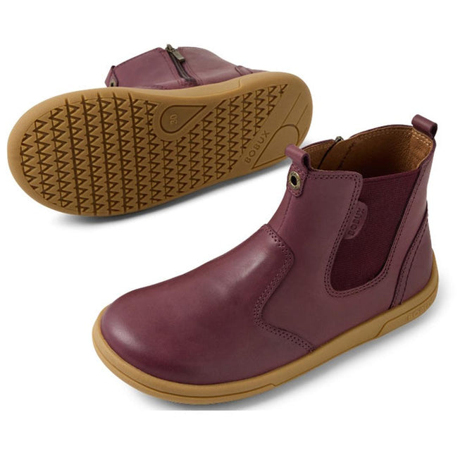 Bobux KP Kids Plus Jodhpur 2 II Juniors Leather Boot Fig Purple: a pair of kids' maroon leather boots with tan rubber soles, flexible sole, side zippers, and elastic panels. One boot stands upright; the other displays its tread pattern., 9420074834980, 9420074834997, 9420074835000, 9420074835017, 9420074835024, 9420074835031, 9420074835048