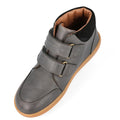 The Bobux Kid+ Timber Boot Charcoal 832924 is a gray high-top unisex leather boot for first walkers, with two Velcro straps, black padded collar, brown lining, and a light brown rubber sole—shown from an angled top view.