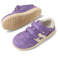The Bobux KP Kids Plus Titan Juniors Leather Sneaker in Purple Haze has beige soles, white accents, hook-and-loop straps, and perforated details. One shoe is top view; the other shows the sole., 9420074855961, 9420074855978, 9420074855985, 9420074855992, 9420074856005, 9420074855961, 9420074855978, 9420074855985, 9420074855992, 9420074856005, 9420074856012, 9420074856029