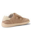 The Bobux KP Kids Plus Titan Juniors Leather Sneaker in Warm Taupe features a beige leather design with a cream heel, adjustable hook-and-loop straps, perforated side panel, and a light beige slip-resistant sole—shown from the side and back., 9420074855893, 9420074855909, 9420074855916, 9420074855923
