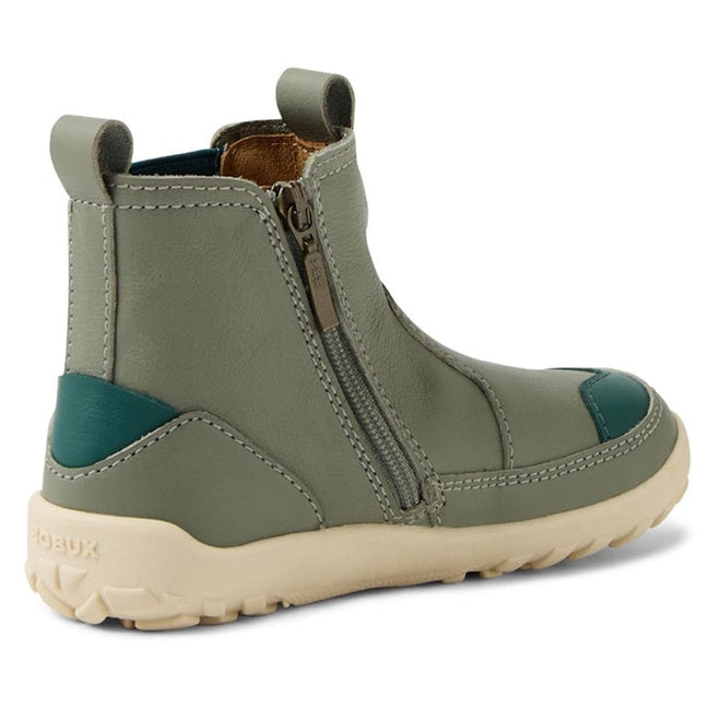 The Bobux KP Kids Plus Trail Leather Boot Juniors Vetiver Green Alpha features sage green leather, a barefoot-shaped toe box, side zipper, beige rubber sole, teal heel and toe accents, plus visible stitching., 9420074824219, 9420074824226, 9420074824233, 9420074824240, 9420074824257, 9420074824264, 9420074824271